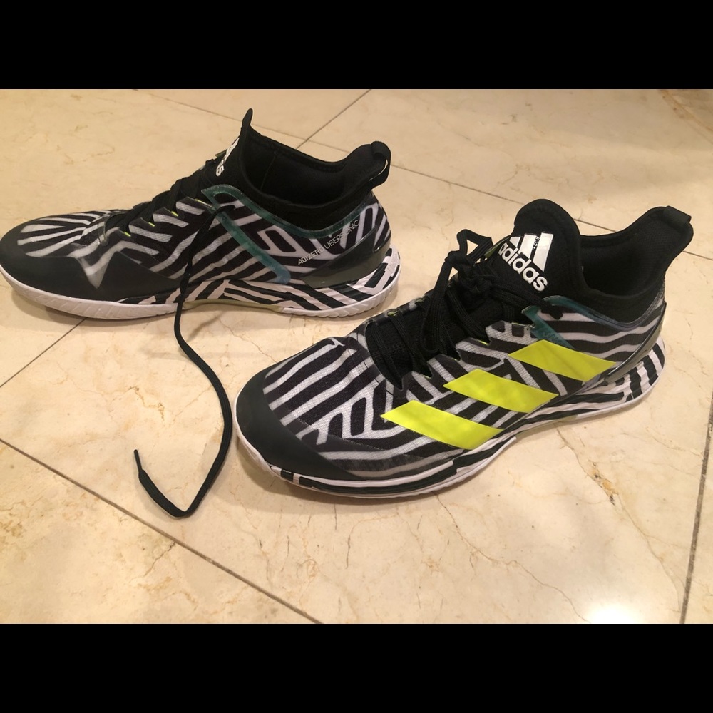 Adidas Uber sonic 4 tennis shoes barely warn .